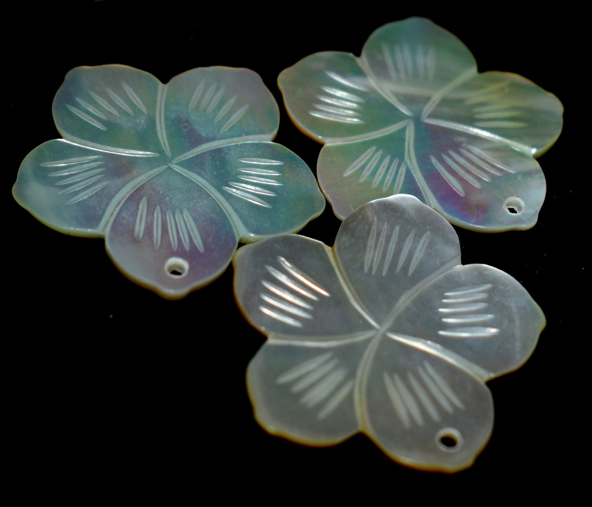 Pearl Shell Flower Carving - Intricate and beautiful flower carvings made from natural pearl shells, perfect for decoration and spiritual purposes. #PearlShellCarving #FlowerCarving #ShellArt #NaturalPearl #DecorativeArt #SpiritualDecor #HandcraftedArt #ShellCrafts #UniqueJewelry #OceanInspired